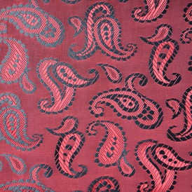 RED PAISLEY VISCOSE 52% ACETATE 48%